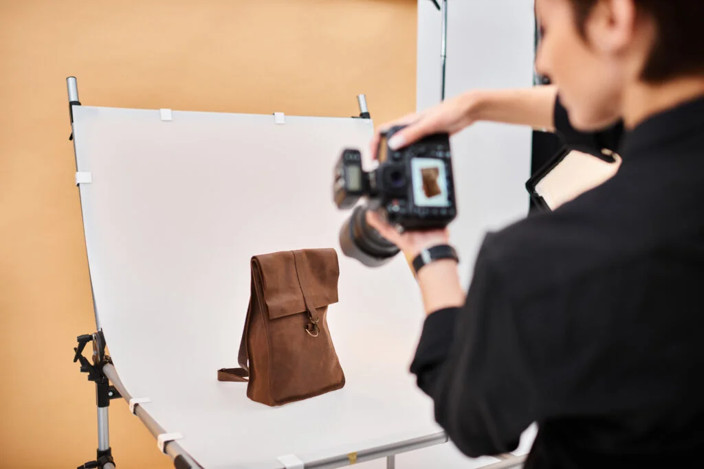 short haired female photographer taking product shots