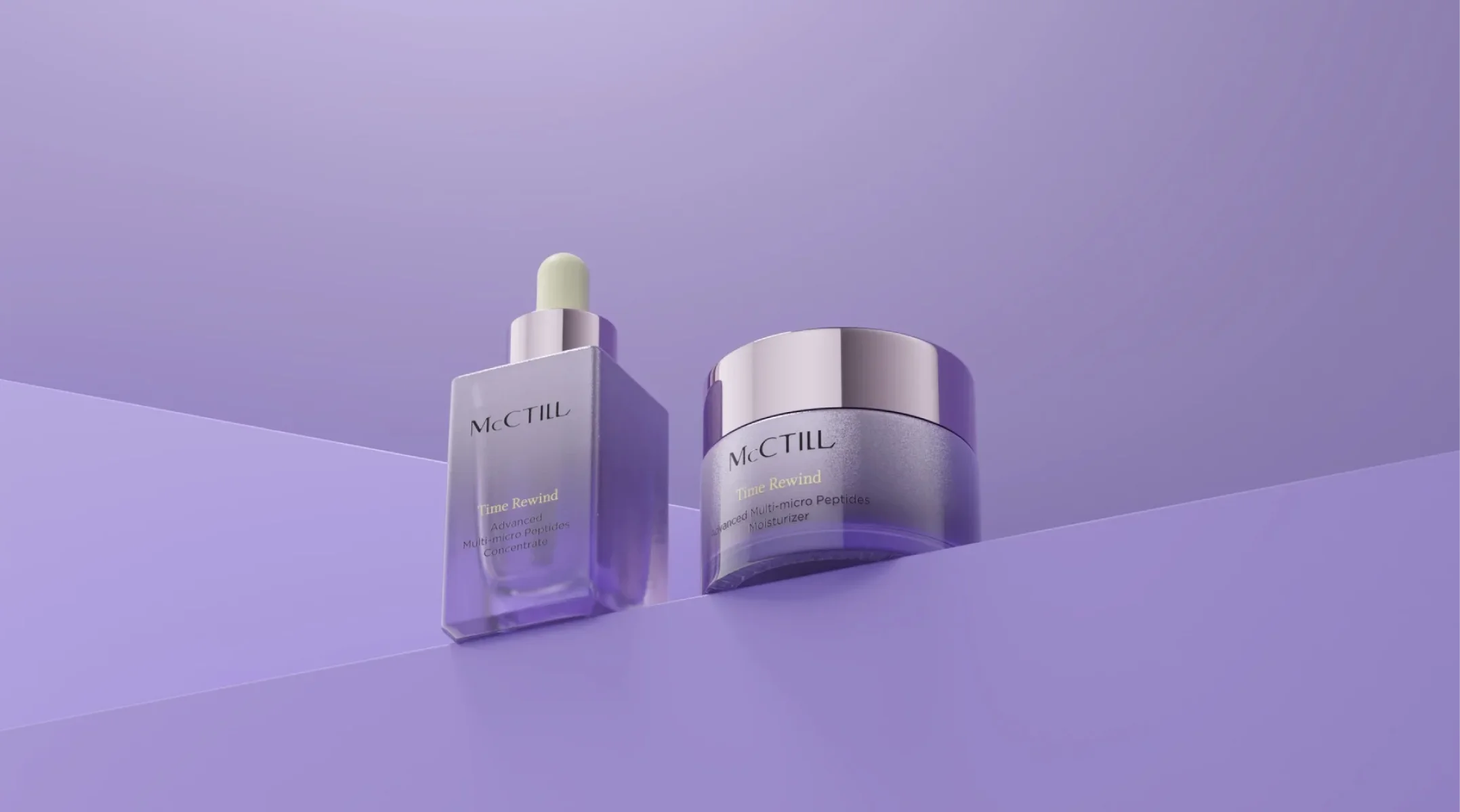 A hero angle shot of skincare products against a purple background.