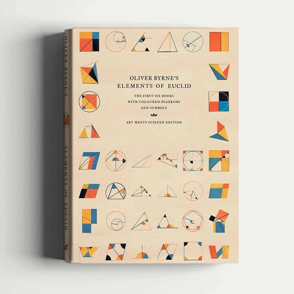 Oliver Byrne's Elements of Euclid hardcover book with colorful geometric diagrams on cream cover against grey background – book product photography